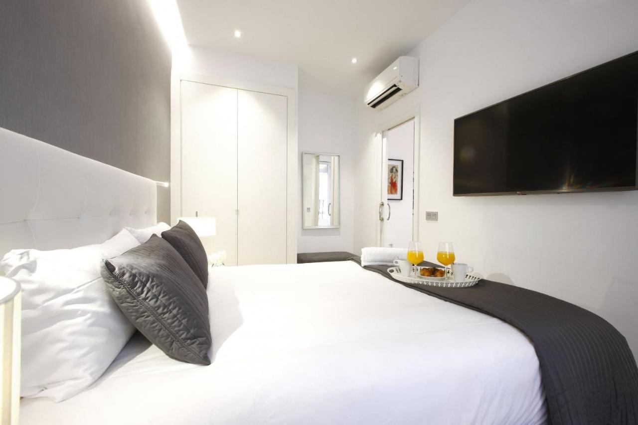 Tirso Boutique Apartment Madrid Bagian luar foto