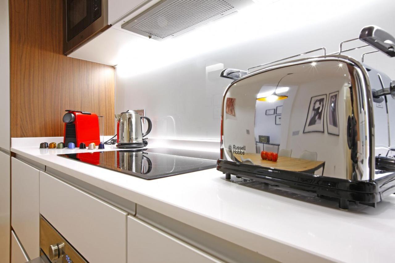 Tirso Boutique Apartment Madrid Bagian luar foto