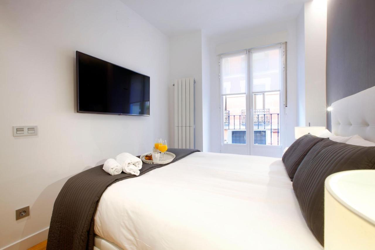 Tirso Boutique Apartment Madrid Bagian luar foto